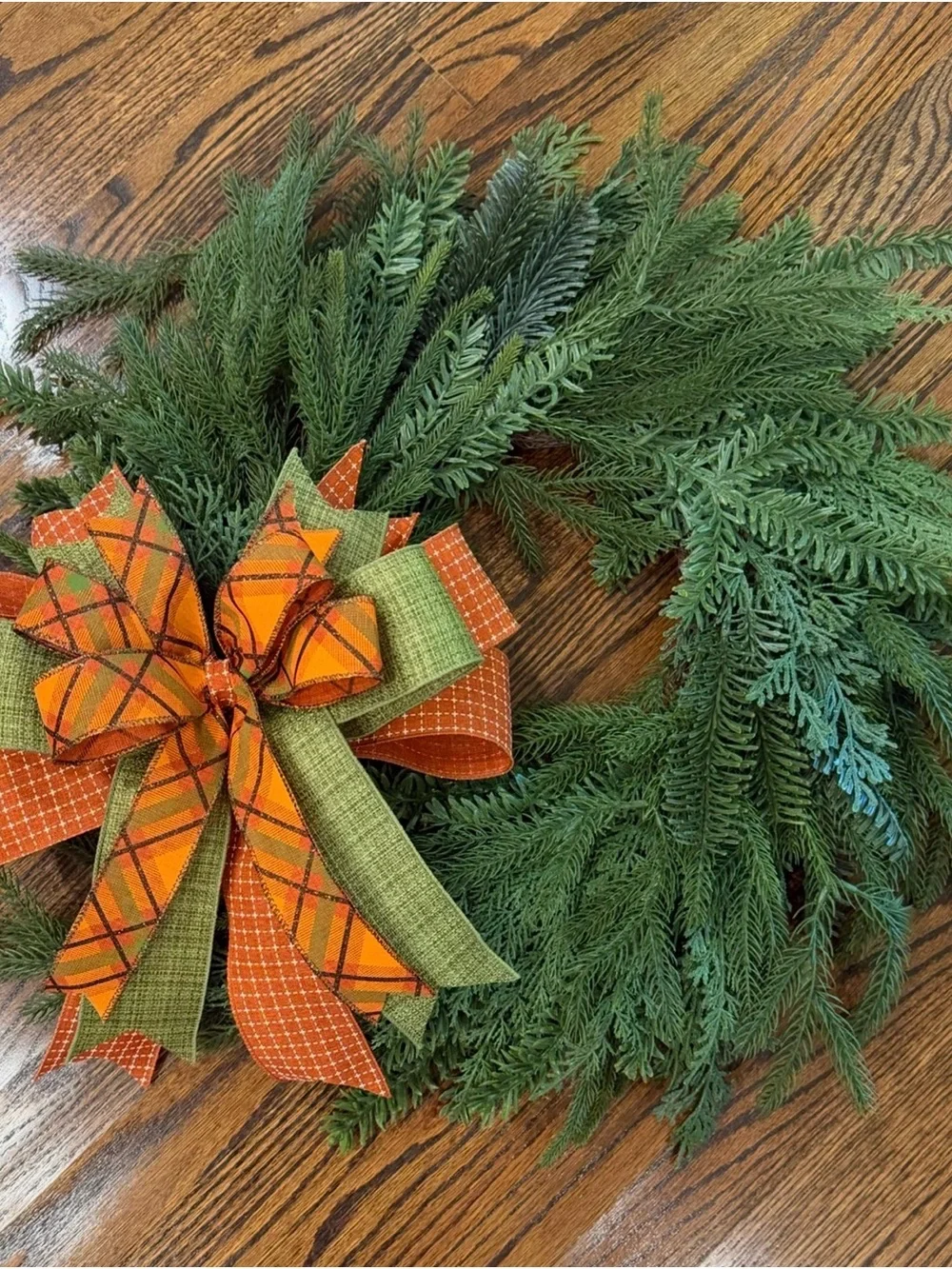Festive Green Holiday Wreath with Orange Plaid and Green Accent Bow